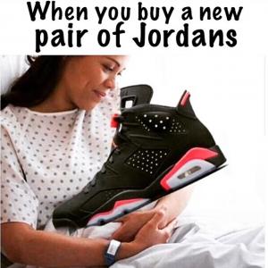 Air Jordan Shoe meme cuddling new pair like a baby