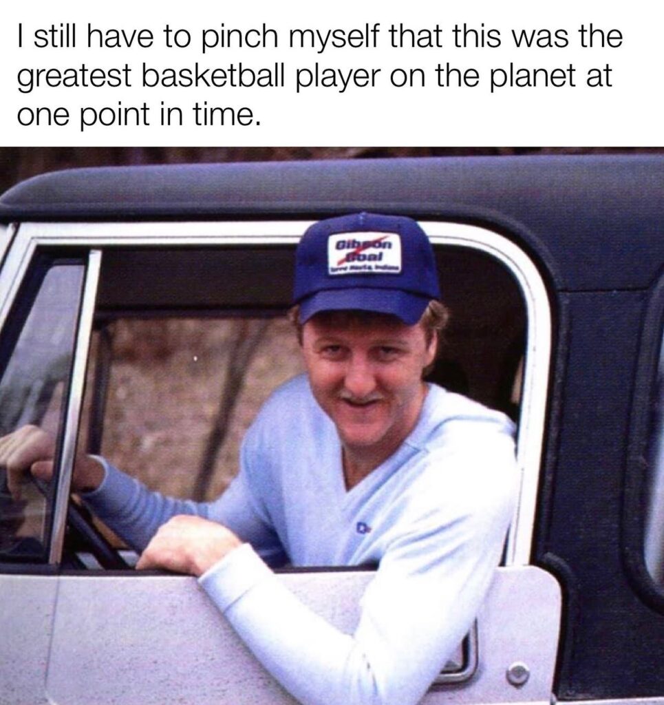 Larry Bird meme hanging out of truck